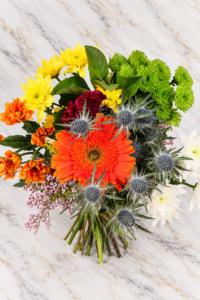 Citrus Meadow Bouquet with orange gerbera, chrysanthemums and blue thistle